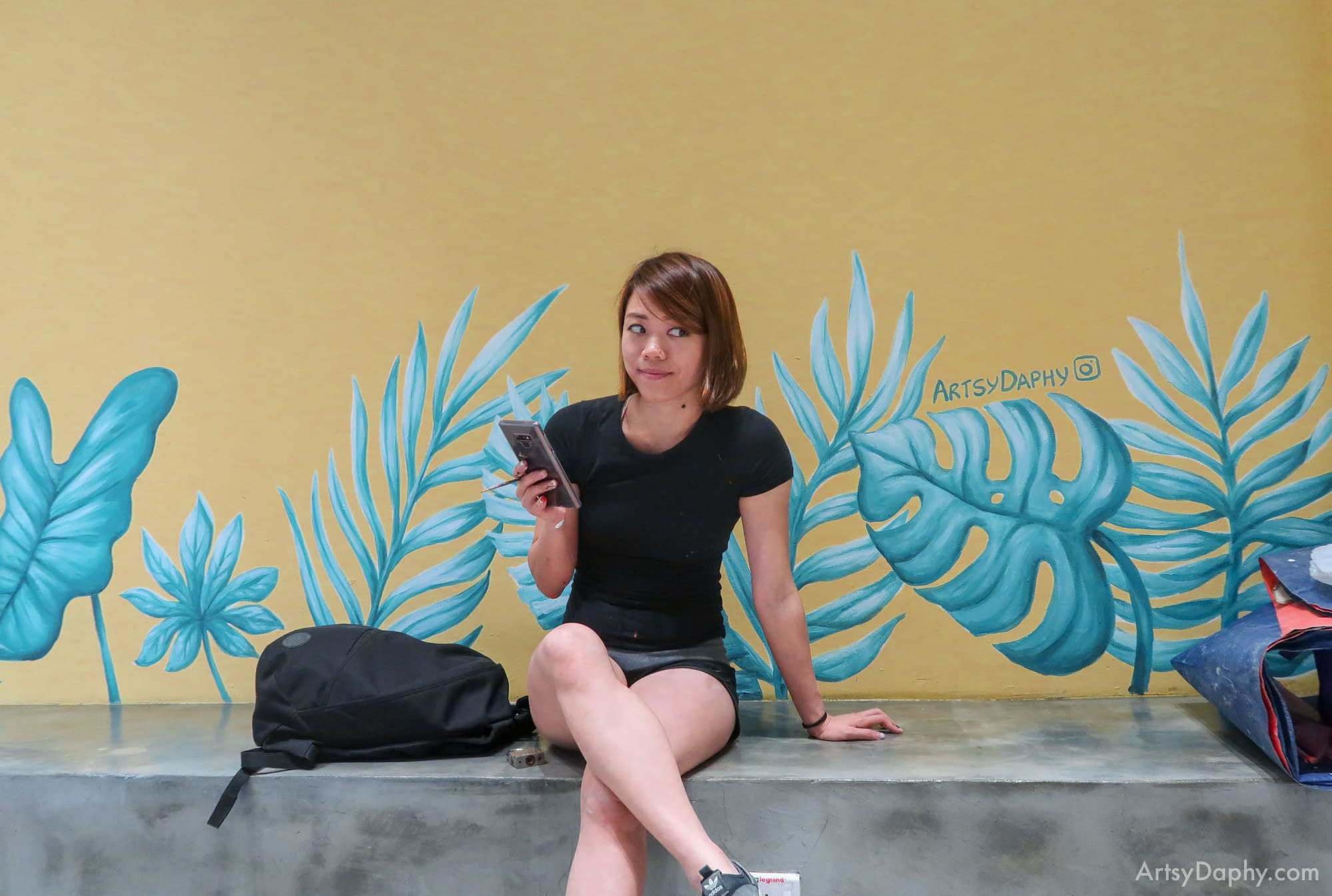 Blue tropical leaf mural painting by artist Artsy Daphy in Ono Poke store Kuching