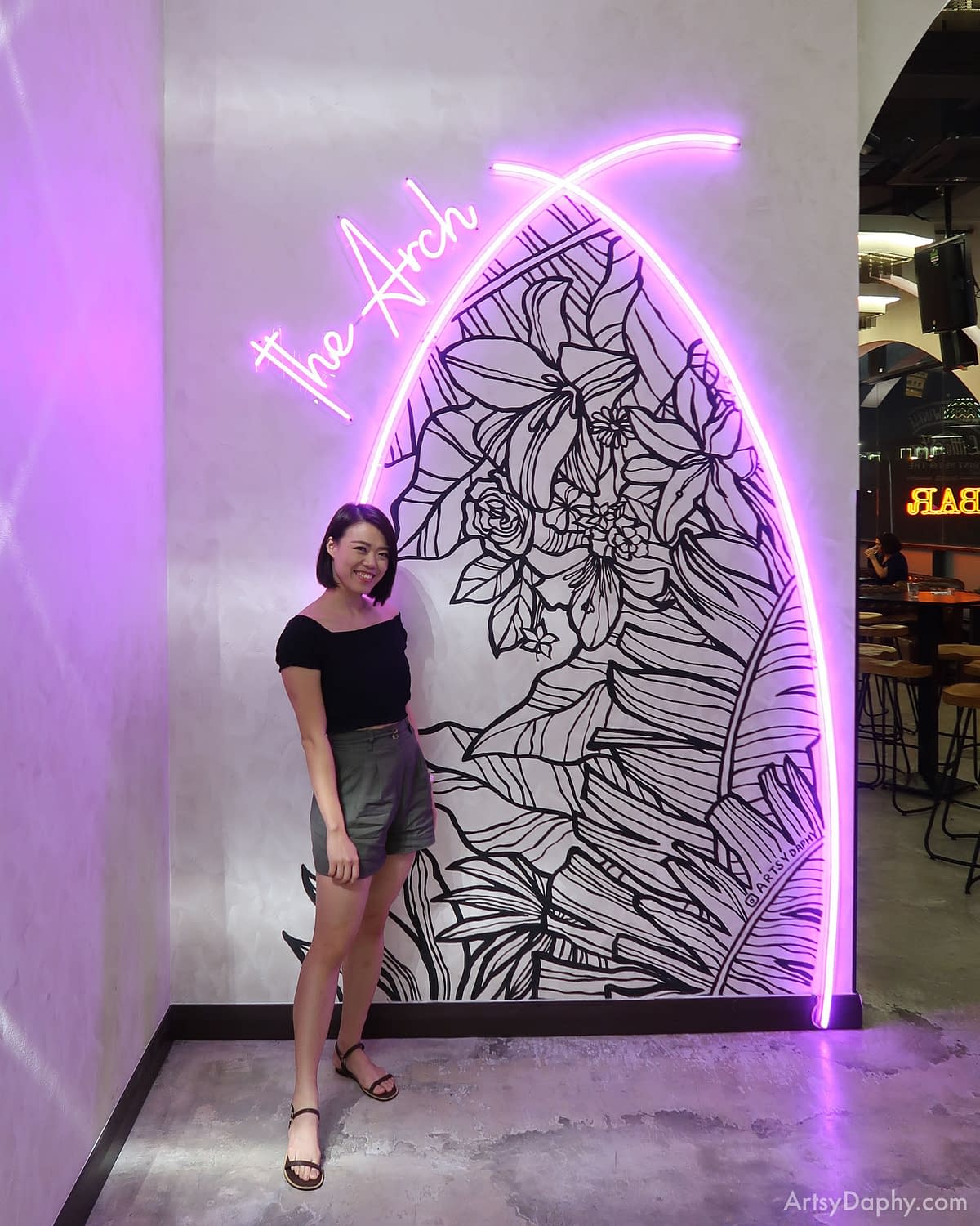 neon light mix line art mural and typography in thai restaurant hartamas, kuala lumpur